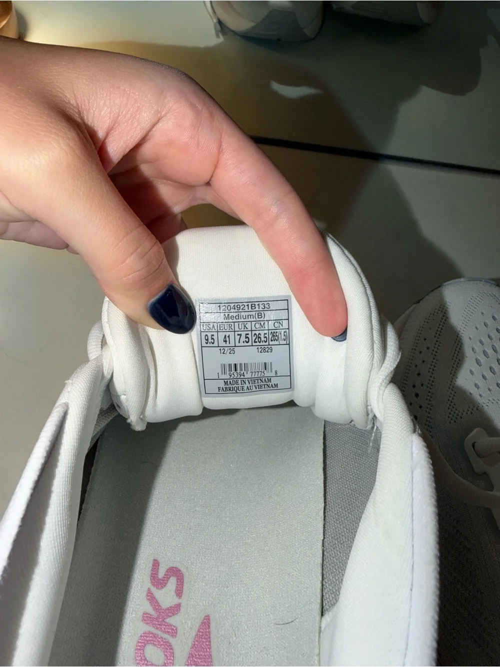 Brooks White Running Shoe with Pink Accent